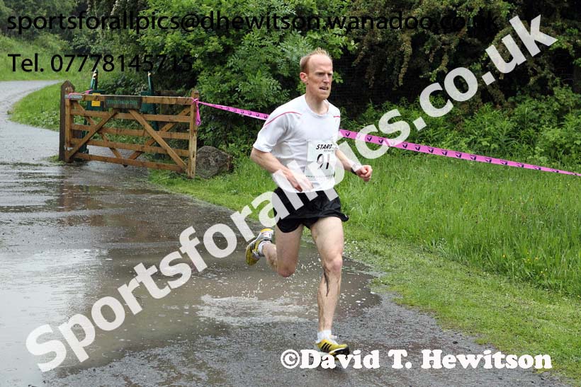 Martin Barmoor (Chichester Runners) finishing the George Ogle Memorial 10k. Photo: David T. Hewitson/Sports for All Pics